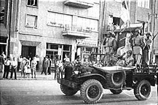  The coup d'tat makers (the Shah's troops) carrying the portrait of the Shah, August 19, 1953
